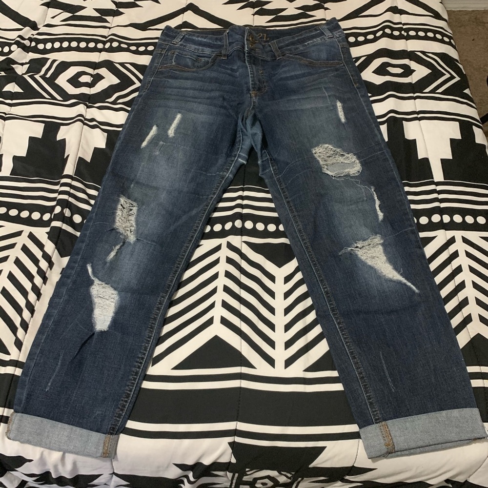 Distressed blue jean pants
